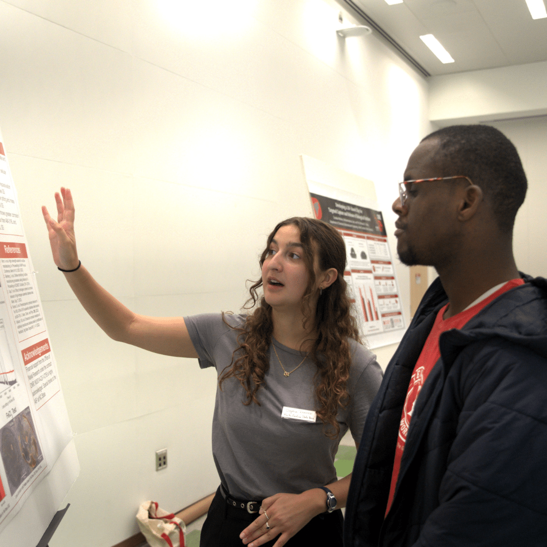 student presenting at symposium
