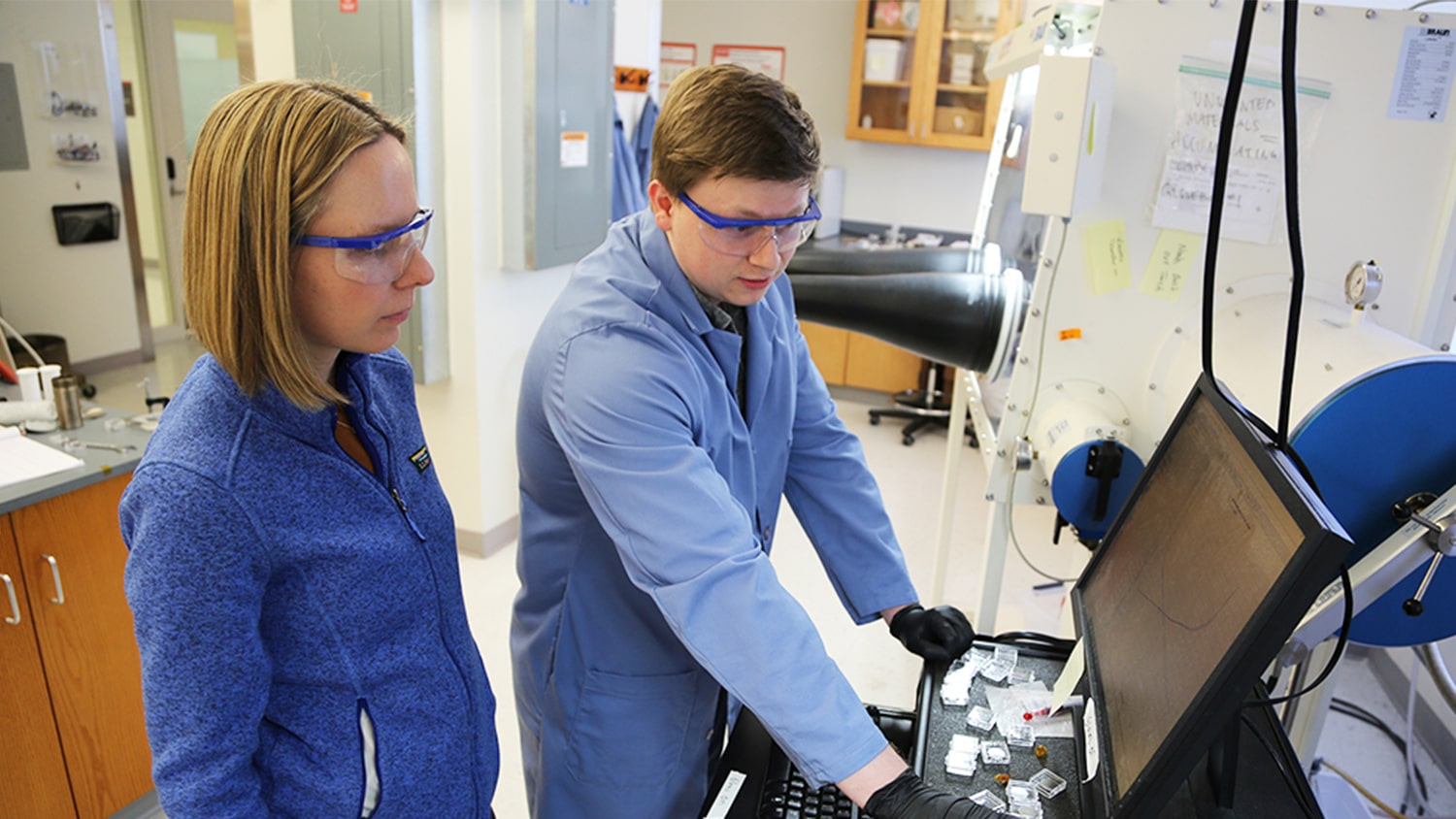 professor and student work in lab